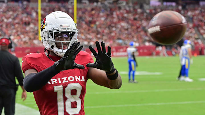 Sep 15, 2024; Glendale, Arizona, USA;  Arizona Cardinals wide receiver Marvin Harrison Jr. (18) catches a ball on the sideline in the first half against the Los Angeles Rams at State Farm Stadium. Mandatory Credit: Matt Kartozian-Imagn Images