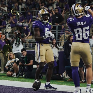 Freshman tight end Decker DeGraaf celebrates a 33-yard TD catch.