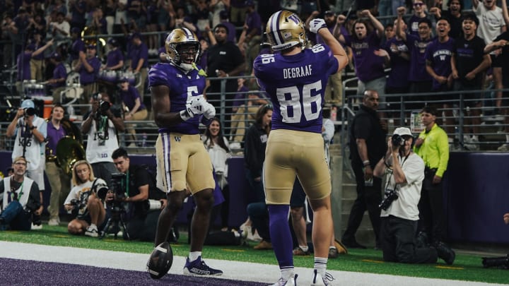 Freshman tight end Decker DeGraaf celebrates a 33-yard TD catch.