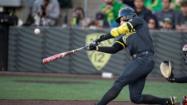 Oregon outfielder Bryce Boettcher hits a home run as the Oregon Ducks host the Oregon State Beavers