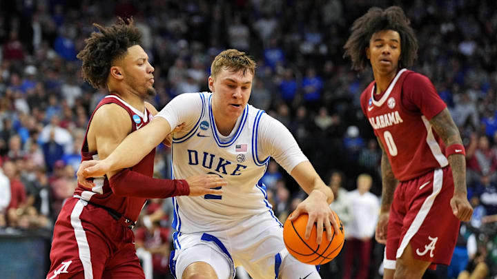 Duke Blue Devils forward Cooper Flagg (2) drives to the basket against Alabama Crimson Tide guard Mark Sears