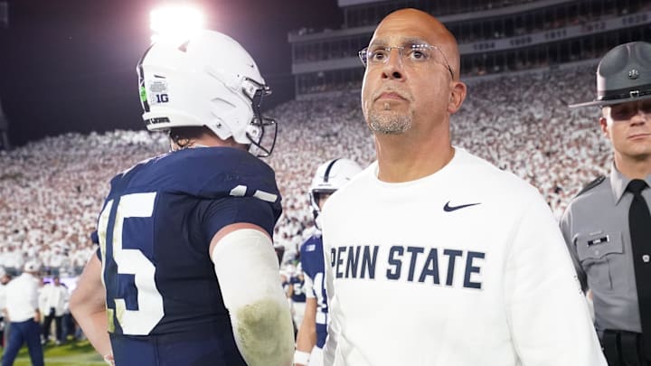 Sep 27, 2025; University Park, Pennsylvania, USA; Penn State Nittany Lions head coach James Franklin and quarterback Drew Allar (15) react after losing to the Oregon Ducks at Beaver Stadium. Mandatory Credit: James Lang-Imagn Images