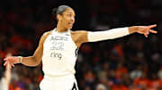 Oct 8, 2025; Phoenix, Arizona, USA; Las Vegas Aces center A'ja Wilson (22) reacts against the Phoenix Mercury in the first half during game three of the 2025 WNBA Finals at PHX Arena. Mandatory Credit: Mark J. Rebilas-Imagn Images