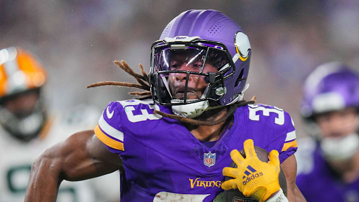 Minnesota Vikings running back Aaron Jones runs with the ball. Minnesota Vikings running back Aaron Jones runs with the ball.