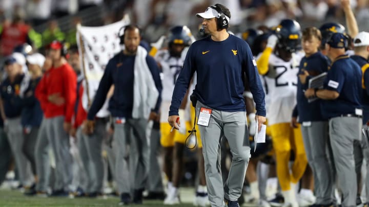 West Virginia Mountaineers head coach Neal Brown looks on from the sideline during the third quarter against the Penn State Nittany Lions at Beaver Stadium in 2023. 
