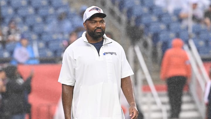 August 8, 2024; Foxborough, MA, USA;  New England Patriots head coach Jerod Mayo  watches as the team warms up before a game against the Carolina Panthers at Gillette Stadium. Mandatory Credit: Eric Canha-USA TODAY Sports