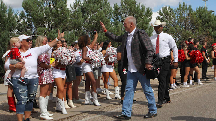 Sep 16, 2023; Lubbock, Texas, USA;  Texas Tech Red Raiders head coach Joey McGuire greets fans outside Jones AT&T Stadium and Cody Campbell Field before the game against the Tarleton State Texans. Mandatory Credit: Michael C. Johnson-Imagn Images