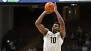 Nov 12, 2025; Nashville, Tennessee, USA;  Vanderbilt Commodores forward Ak Okereke (10) shoots a three point basket against the Eastern Kentucky Colonels during the second half at Memorial Gymnasium. Mandatory Credit: Steve Roberts-Imagn Images