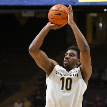 Nov 12, 2025; Nashville, Tennessee, USA;  Vanderbilt Commodores forward Ak Okereke (10) shoots a three point basket against the Eastern Kentucky Colonels during the second half at Memorial Gymnasium. Mandatory Credit: Steve Roberts-Imagn Images