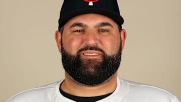 Minnesota Twins coach Derek Shomon (67) poses for a photo during photo day at Hammond Stadium. 