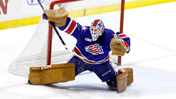 Rochester goalie Devon Levi makes a big save on this shot against Laval.