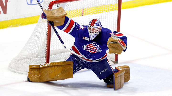 Rochester goalie Devon Levi makes a big save on this shot against Laval.