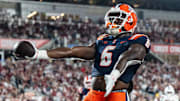 Dec 31, 2024; Orlando, FL, USA; Illinois Fighting Illini running back Josh McCray (6) celebrates his touchdown against the South Carolina Gamecocks in the fourth quarter at Camping World Stadium. Mandatory Credit: Jeremy Reper-Imagn Images