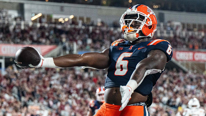 Dec 31, 2024; Orlando, FL, USA; Illinois Fighting Illini running back Josh McCray (6) celebrates his touchdown against the South Carolina Gamecocks in the fourth quarter at Camping World Stadium. Mandatory Credit: Jeremy Reper-Imagn Images Dec 31, 2024; Orlando, FL, USA; Illinois Fighting Illini running back Josh McCray (6) celebrates his touchdown against the South Carolina Gamecocks in the fourth quarter at Camping World Stadium. Mandatory Credit: Jeremy Reper-Imagn Images