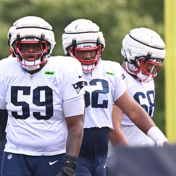 Aug 03, 2024; Foxborough, MA, USA; New England Patriots offensive tackle Vederian Lowe (59) waits to do a drill during training camp at Gillette Stadium. Mandatory Credit: Eric Canha-USA TODAY Sports