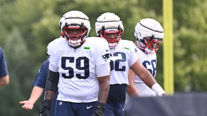 Aug 03, 2024; Foxborough, MA, USA; New England Patriots offensive tackle Vederian Lowe (59) waits to do a drill during training camp at Gillette Stadium. Mandatory Credit: Eric Canha-USA TODAY Sports