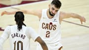 Apr 20, 2025; Cleveland, Ohio, USA; Cleveland Cavaliers guard Ty Jerome (2) and guard Darius Garland (10) celebrate in the fourth quarter against the Miami Heat at Rocket Arena. Mandatory Credit: David Richard-Imagn Images