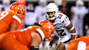 Oct 18, 2025; Stillwater, Oklahoma, USA; Cincinnati Bearcats linebacker Jonathan Thompson (22) behind the line during the second half against the Oklahoma State Cowboys at Boone Pickens Stadium. Mandatory Credit: William Purnell-Imagn Images