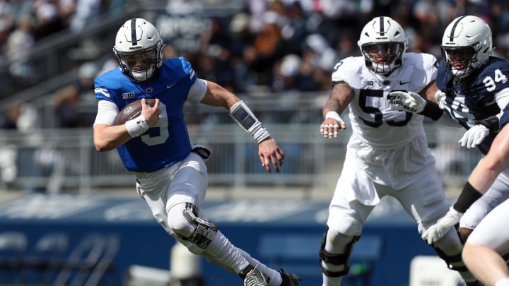 Penn State Nittany Lions quarterback Beau Pribula runs with the ball during the Blue-White spring game at Beaver Stadium. 