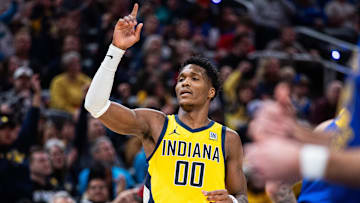 Jan 10, 2025; Indianapolis, Indiana, USA; Indiana Pacers guard Bennedict Mathurin (00) celebrates a made basket  in the second half against the Golden State Warriors at Gainbridge Fieldhouse. Mandatory Credit: Trevor Ruszkowski-Imagn Images