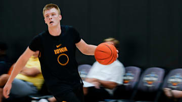 Iowa’s Bennett Stirtz (14) brings the ball up court during practice June 19, 2025 at Carver-Hawkeye Arena in Iowa City, Iowa.