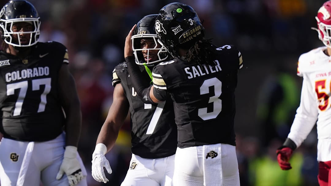 Oct 11, 2025; Boulder, Colorado, USA; Colorado Buffaloes running back Dallan Hayden (7) and quarterback Kaidon Salter (3) celebrate a first down in the against the Iowa State Cyclones at Folsom Field. Mandatory Credit: Ron Chenoy-Imagn Images