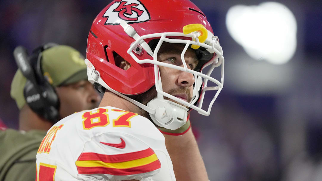 Kansas City Chiefs tight end Travis Kelce puts on his helmet getting ready to take the field during first half action at Highmark Stadium in Orchard Park on Nov. 2, 2025.