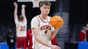 Mar 19, 2025; Denver, CO, USA; Wisconsin Badgers forward Nolan Winter (31) warms up during practice at Ball Arena. Mandatory Credit: Ron Chenoy-Imagn Images