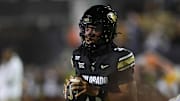 Sep 20, 2025; Boulder, Colorado, USA; Colorado Buffaloes quarterback Kaidon Salter (3) warms up before the game against the Wyoming Cowboys at Folsom Field. Mandatory Credit: Ron Chenoy-Imagn Images