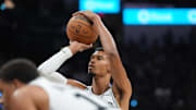 Oct 26, 2025; San Antonio, Texas, USA; San Antonio Spurs forward Victor Wembanyama (1) shoots a free throw in the first half at Frost Bank Center. Mandatory Credit: Daniel Dunn-Imagn Images