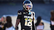 Aug 29, 2024; Boulder, Colorado, USA; Colorado Buffaloes wide receiver Travis Hunter (12) reacts after scoring a touchdown in the first half against the North Dakota State Bison at Folsom Field.