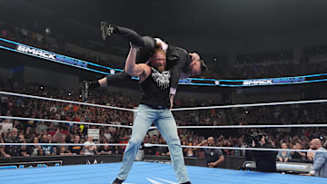 Brock Lesnar lays the smackdown, appropriately enough on WWE Friday Night Smackdown.