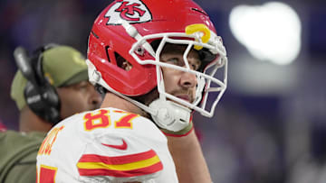 Kansas City Chiefs tight end Travis Kelce puts on his helmet getting ready to take the field during first half action at Highmark Stadium in Orchard Park on Nov. 2, 2025.