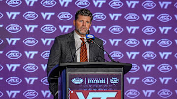 Jul 23, 2024; Charlotte, NC, USA; Virginia Tech head coach Brent Pry answers questions from the media during the ACC Kickoff at Hilton Charlotte Uptown. Mandatory Credit: Jim Dedmon-Imagn Images