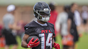 Jun 3, 2024; Atlanta, GA, USA; Atlanta Falcons wide receiver Rondale Moore (14) runs with the ball during Falcons OTA at the Falcons Training facility. Mandatory Credit: Dale Zanine-Imagn Images
