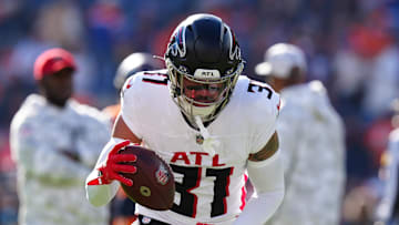 Atlanta Falcons safety Justin Simmons warms up before the game against the Denver Broncos.