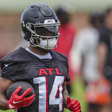 Jun 3, 2024; Atlanta, GA, USA; Atlanta Falcons wide receiver Rondale Moore (14) runs with the ball during Falcons OTA at the Falcons Training facility. Mandatory Credit: Dale Zanine-Imagn Images