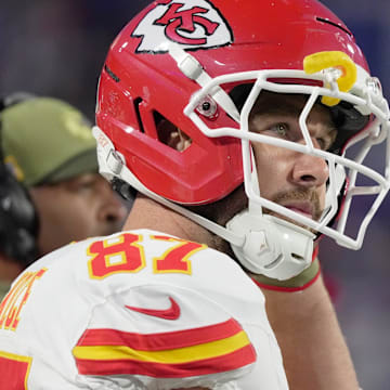Kansas City Chiefs tight end Travis Kelce puts on his helmet getting ready to take the field during first half action at Highmark Stadium in Orchard Park on Nov. 2, 2025.