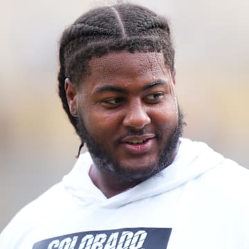 Aug 29, 2024; Boulder, Colorado, USA; Colorado Buffaloes offensive tackle Jordan Seaton (77) before the game against the North Dakota State Bison at Folsom Field. 