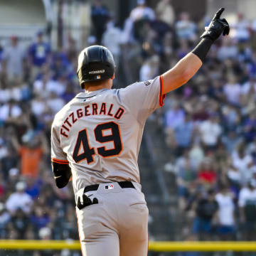 San Francisco Giants outfielder Tyler Fitzgerald (49) reacts after hitting a home run against the Colorado Rockies in the third inning at Coors Field on July 20.