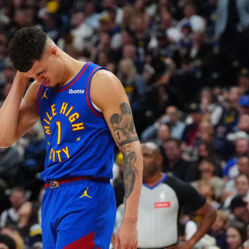 May 4, 2024; Denver, Colorado, USA; Denver Nuggets forward Michael Porter Jr. (1) following an injury in the second half against the Minnesota Timberwolves during game one of the second round for the 2024 NBA playoffs at Ball Arena. Mandatory Credit: Ron Chenoy-USA TODAY Sports