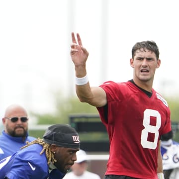 Jul 27, 2023; East Rutherford, NJ, USA;  New York Giants quarterback Daniel Jones (8) gestures on day two of training camp at the Quest Diagnostics Training Facility.  