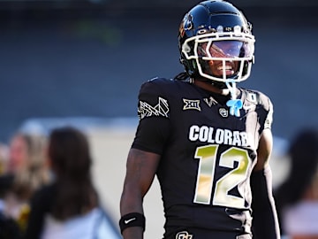 Aug 29, 2024; Boulder, Colorado, USA; Colorado Buffaloes wide receiver Travis Hunter (12) reacts after scoring a touchdown in the first half against the North Dakota State Bison at Folsom Field.