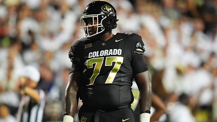 Aug 29, 2024; Boulder, Colorado, USA; Colorado Buffaloes offensive tackle Jordan Seaton (77) during the second half against the North Dakota State Bison at Folsom Field. Mandatory Credit: Ron Chenoy-Imagn Images