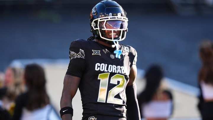 Aug 29, 2024; Boulder, Colorado, USA; Colorado Buffaloes wide receiver Travis Hunter (12) reacts after scoring a touchdown in the first half against the North Dakota State Bison at Folsom Field. Mandatory Credit: Ron Chenoy-USA TODAY Sports