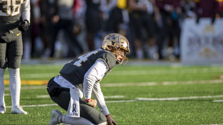 Minnesota placeholder Casey O'Brien (14) waits for the ball to be snapped to place the hold in the second half against Maryland at TCF Bank Stadium in Minneapolis on Oct. 26, 2019.