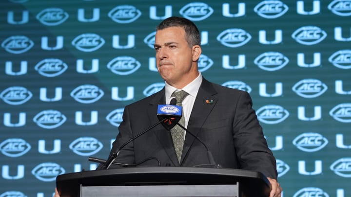 Jul 24, 2024; Charlotte, NC, USA;  Miami Hurricanes head coach Mario Cristobal speaks to the media during the ACC Kickoff at Hilton Charlotte Uptown. Mandatory Credit: Jim Dedmon-USA TODAY Sports