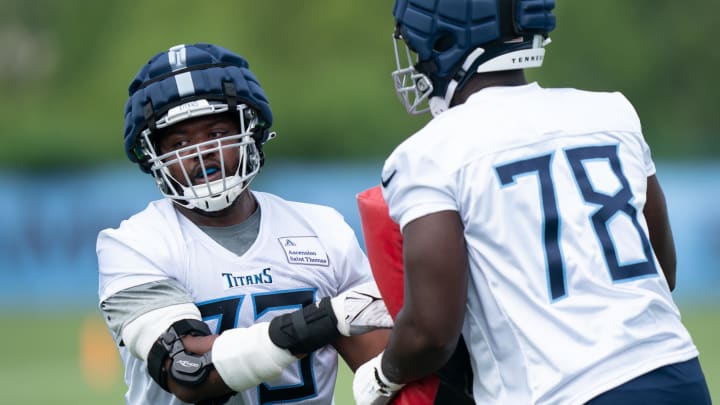 July 26, 2023; Nashville, TN, USA; Tennessee Titans offensive lineman Jamarco Jones (73) lines up against Nicholas Petit-Frere (78) to run through drills during the first day of training camp at the practice facility St. Thomas Sports Park. Mandatory Credit: Denny Simmons - USA Today Sports Network via The Tennessean