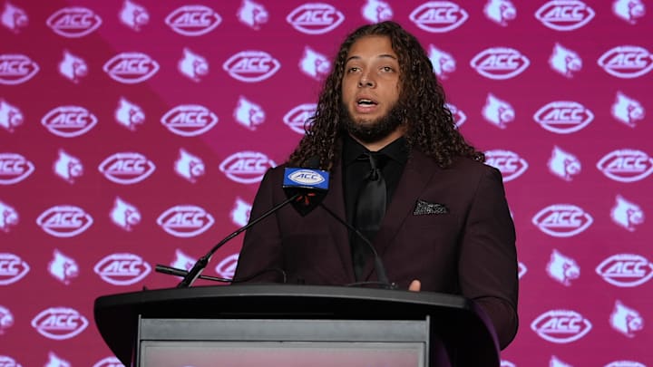 Jul 24, 2024; Charlotte, NC, USA;  Louisville Cardinals defensive lineman Ashton Gillotte speaks to the media during the ACC Kickoff at Hilton Charlotte Uptown. Mandatory Credit: Jim Dedmon-Imagn Images