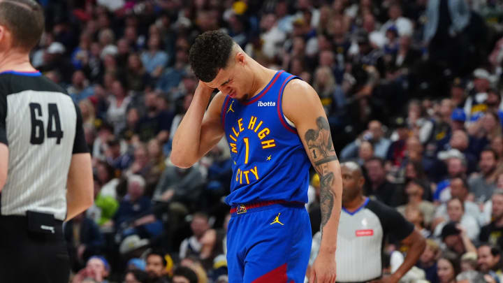 May 4, 2024; Denver, Colorado, USA; Denver Nuggets forward Michael Porter Jr. (1) following an injury in the second half against the Minnesota Timberwolves during game one of the second round for the 2024 NBA playoffs at Ball Arena. Mandatory Credit: Ron Chenoy-USA TODAY Sports